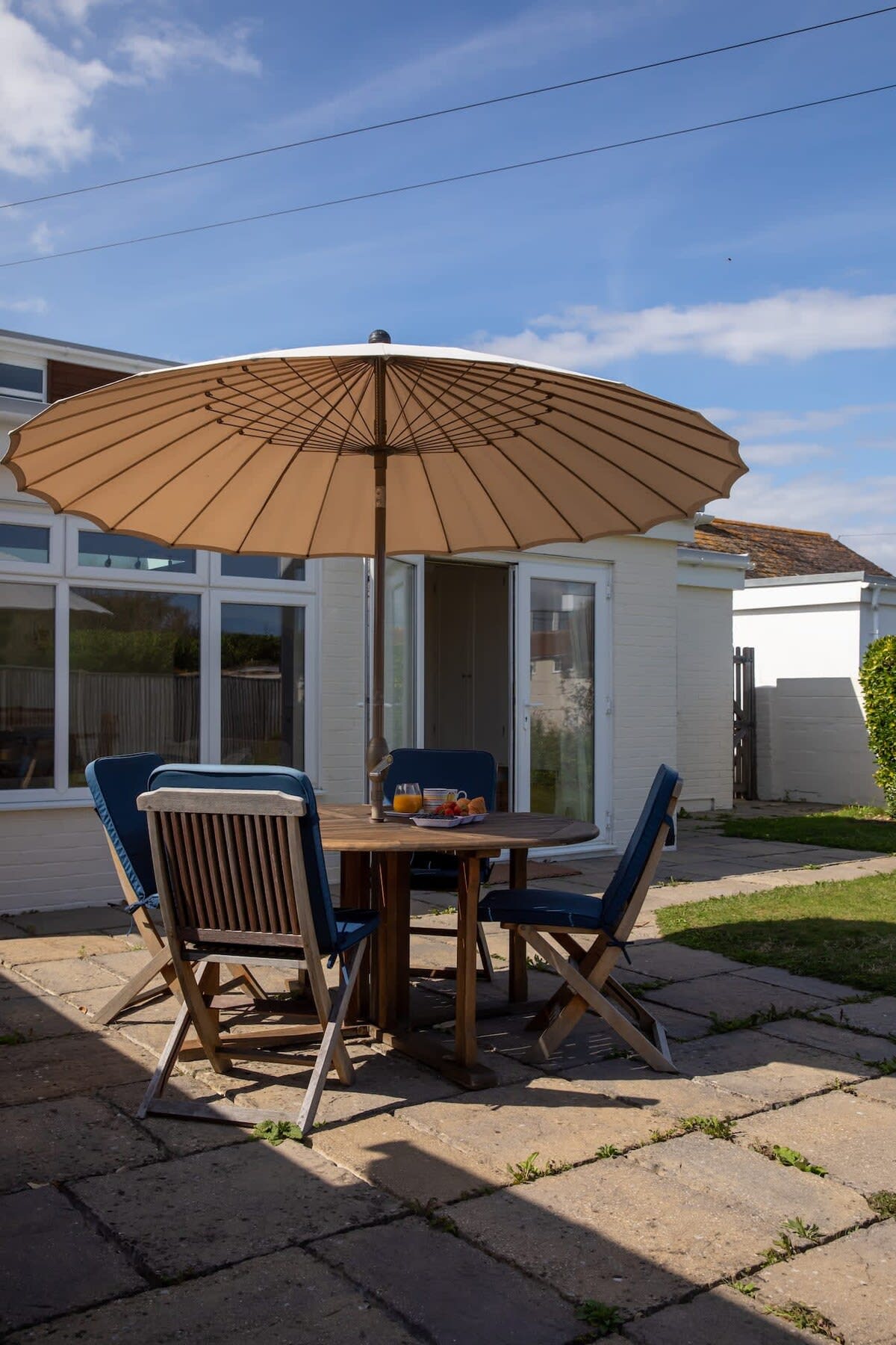 Soak up the sun, or seek shade under the parasol.