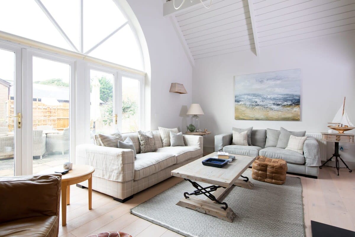 A beautiful view of the courtyard through the arched window