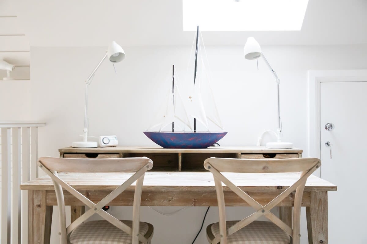 As you’d expect in a study, there’s a desk and chairs