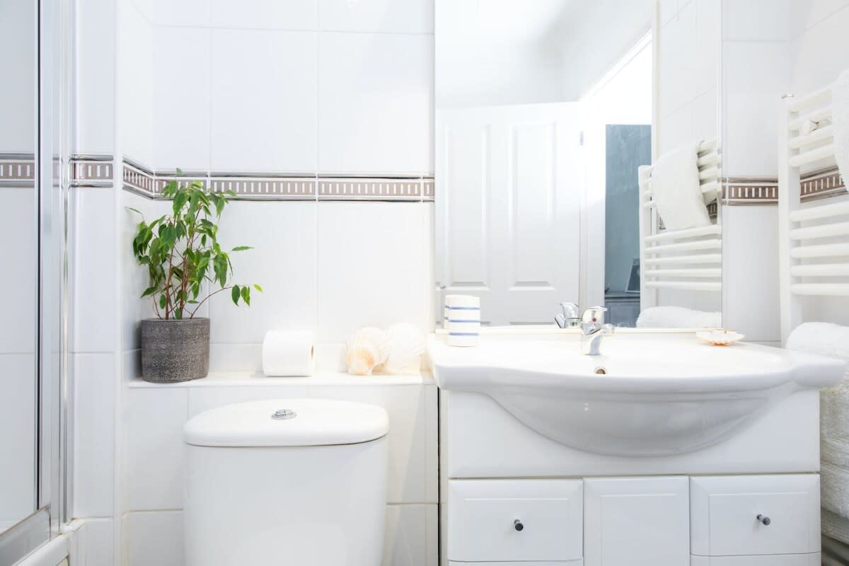 Another angle of the downstairs bathroom with tub and shower.