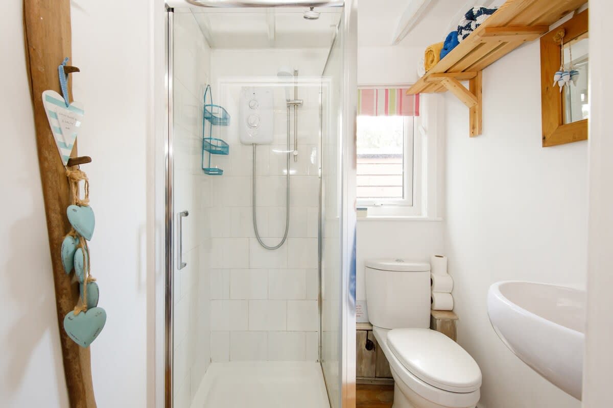 The shower room is perfect for freshening up after a day at the beach.