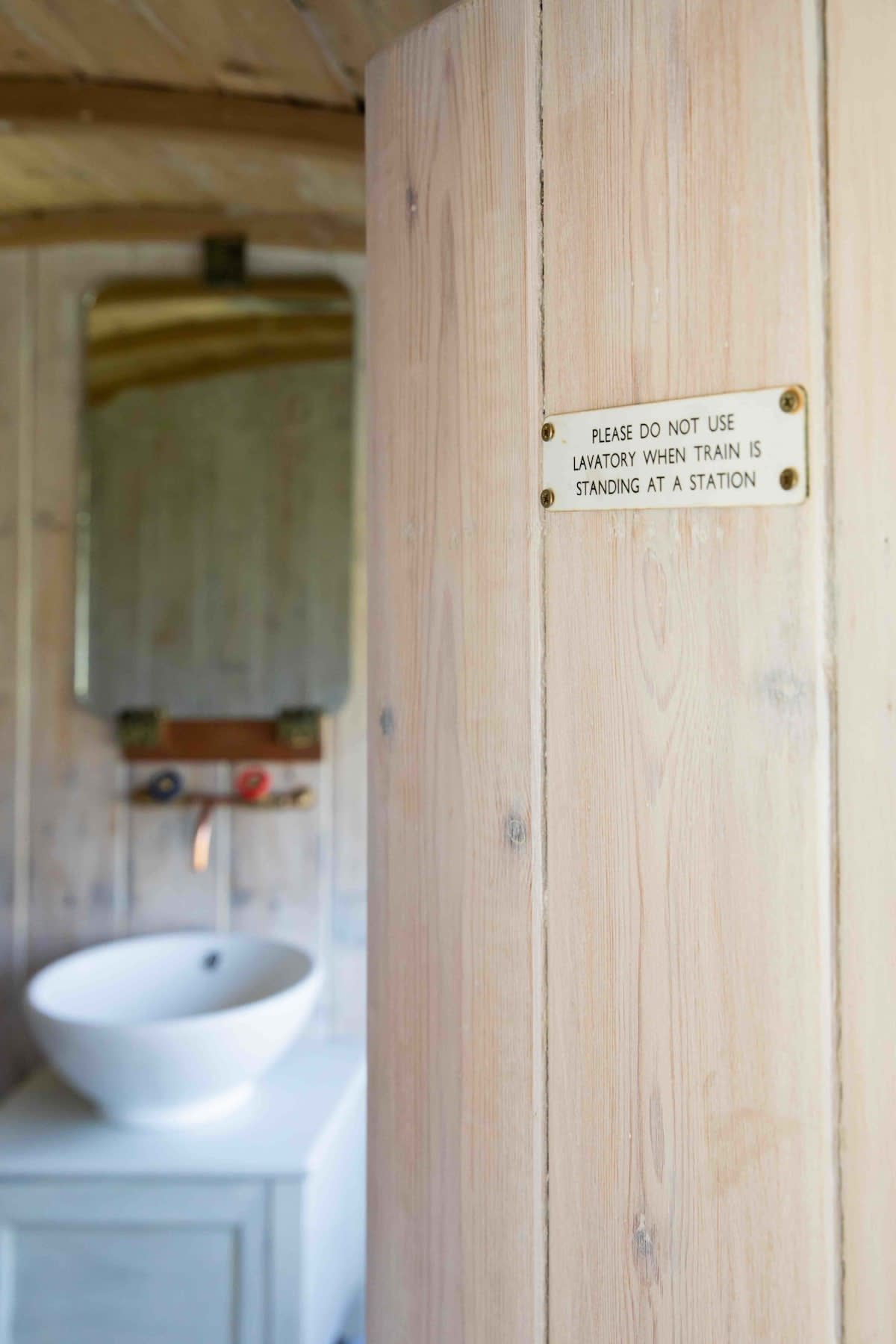 Fun signs remind you that where you're staying was once a train!