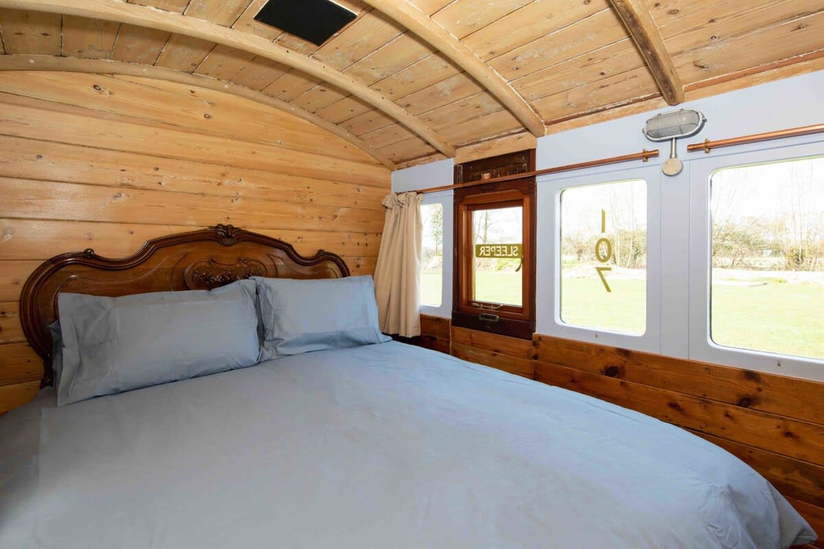 Cosy up in the comfy bed for a great night's sleep in the countryside.