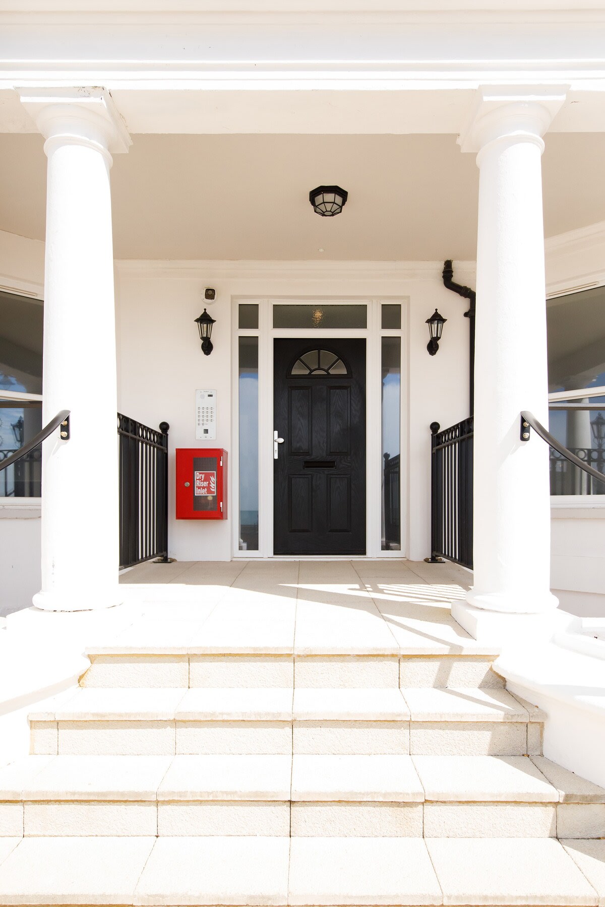 The impressive entrance to the apartment building – The Royal.