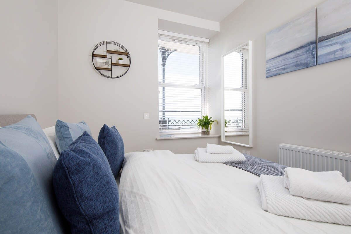 The bedroom at the front of the house has sea views