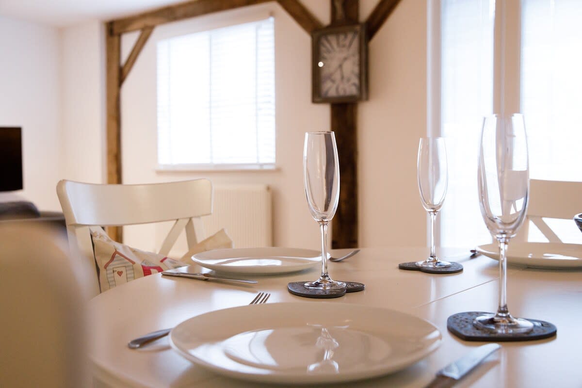 There is a small dining area, with table and chairs, to enjoy meals and snacks.