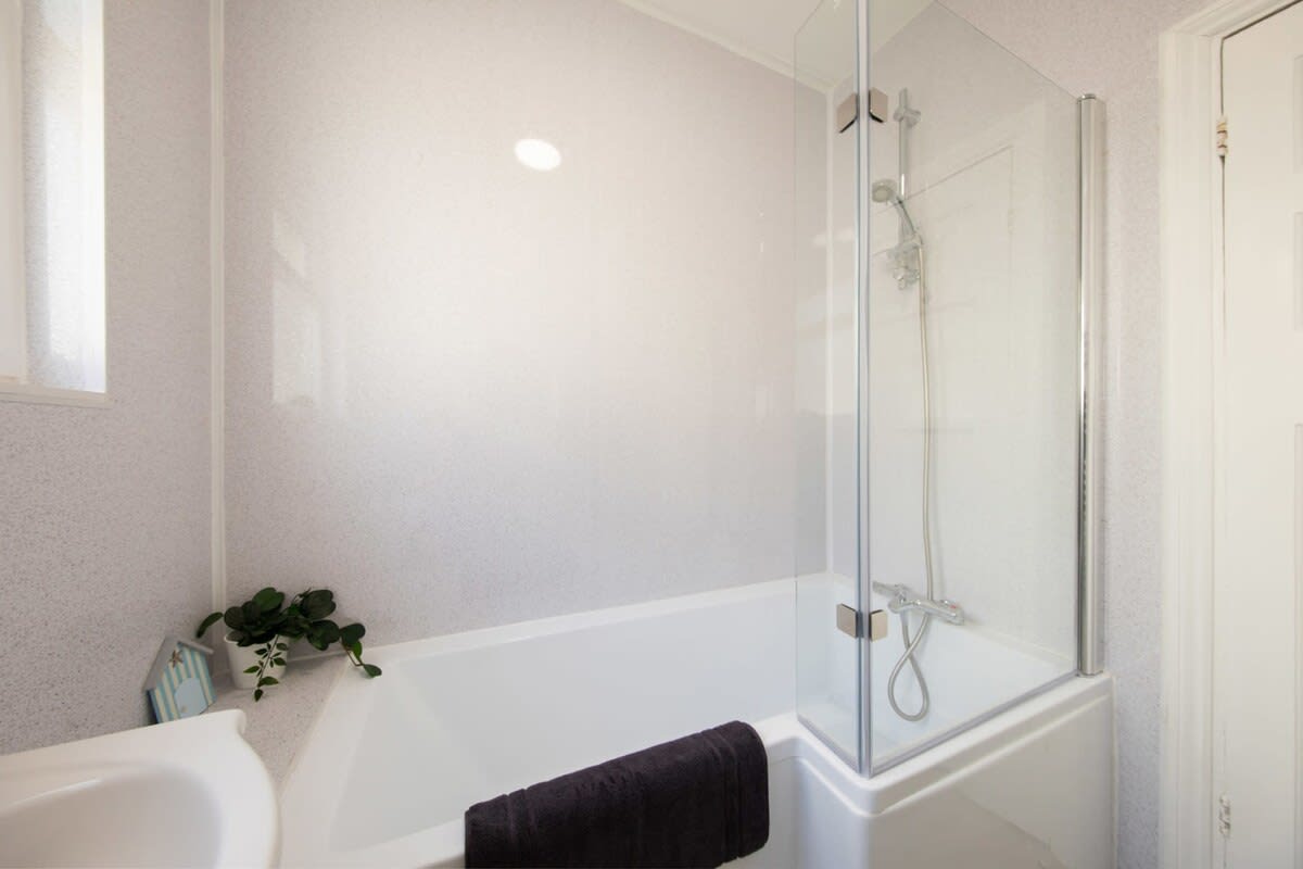 Take a relaxing bath in the family bathroom after a day spent seeing the sights