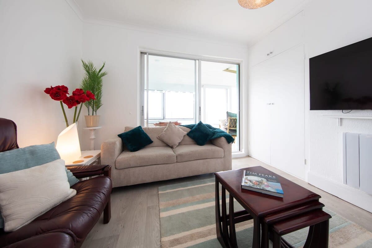 Listen to the sounds of the waves crashing from the living room