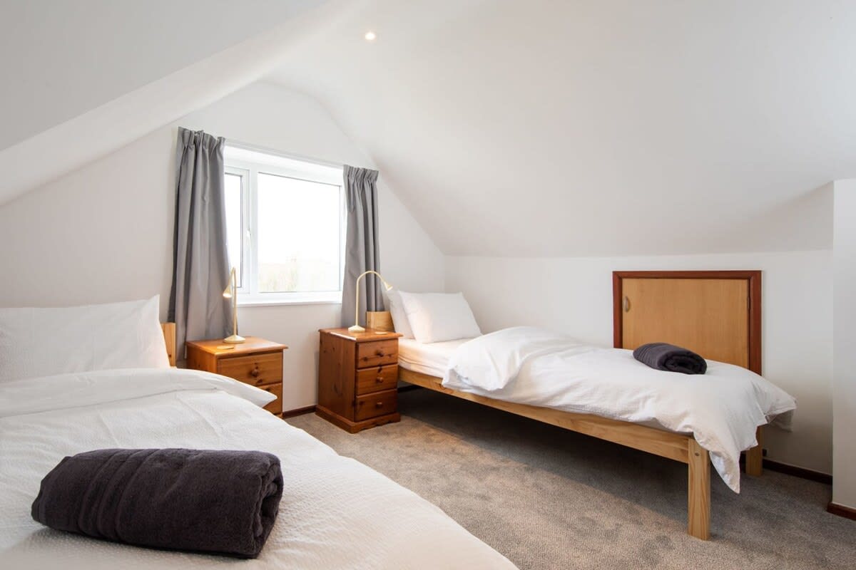 Enjoy the beautiful architecture and character of the upstairs loft bedrooms