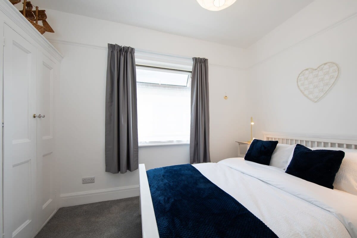 Bedroom seven (1st floor) with a double bed and plenty of closet space for you to unpack