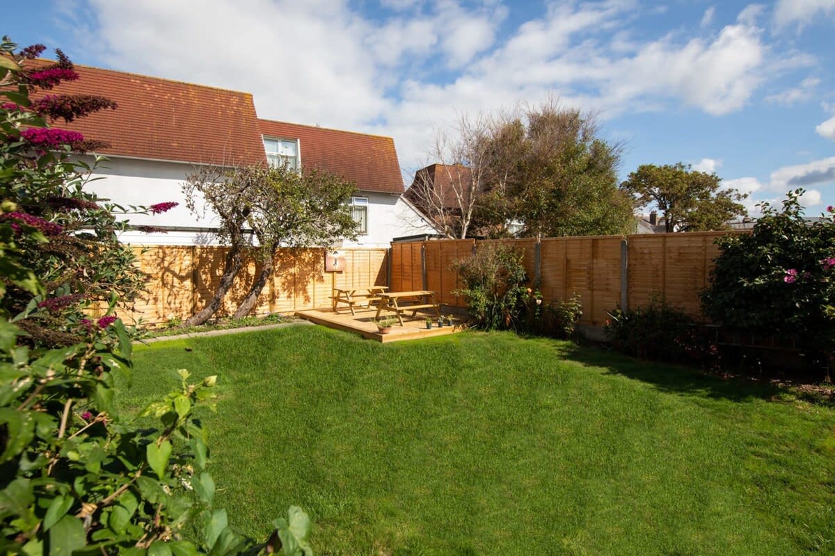 Guests have access to the grassy rear garden