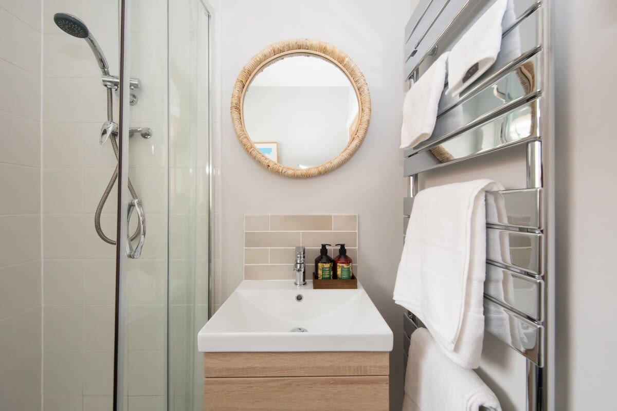 Includes a mirror, toilet and basin unit