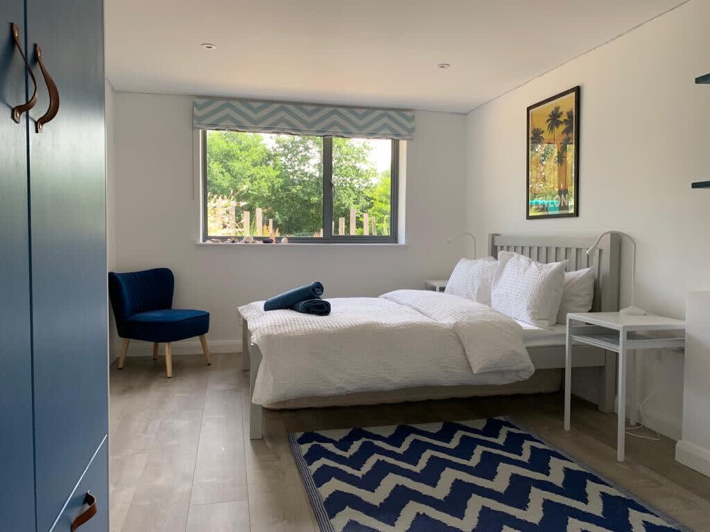 The fourth bedroom on the ground floor features a new double bed