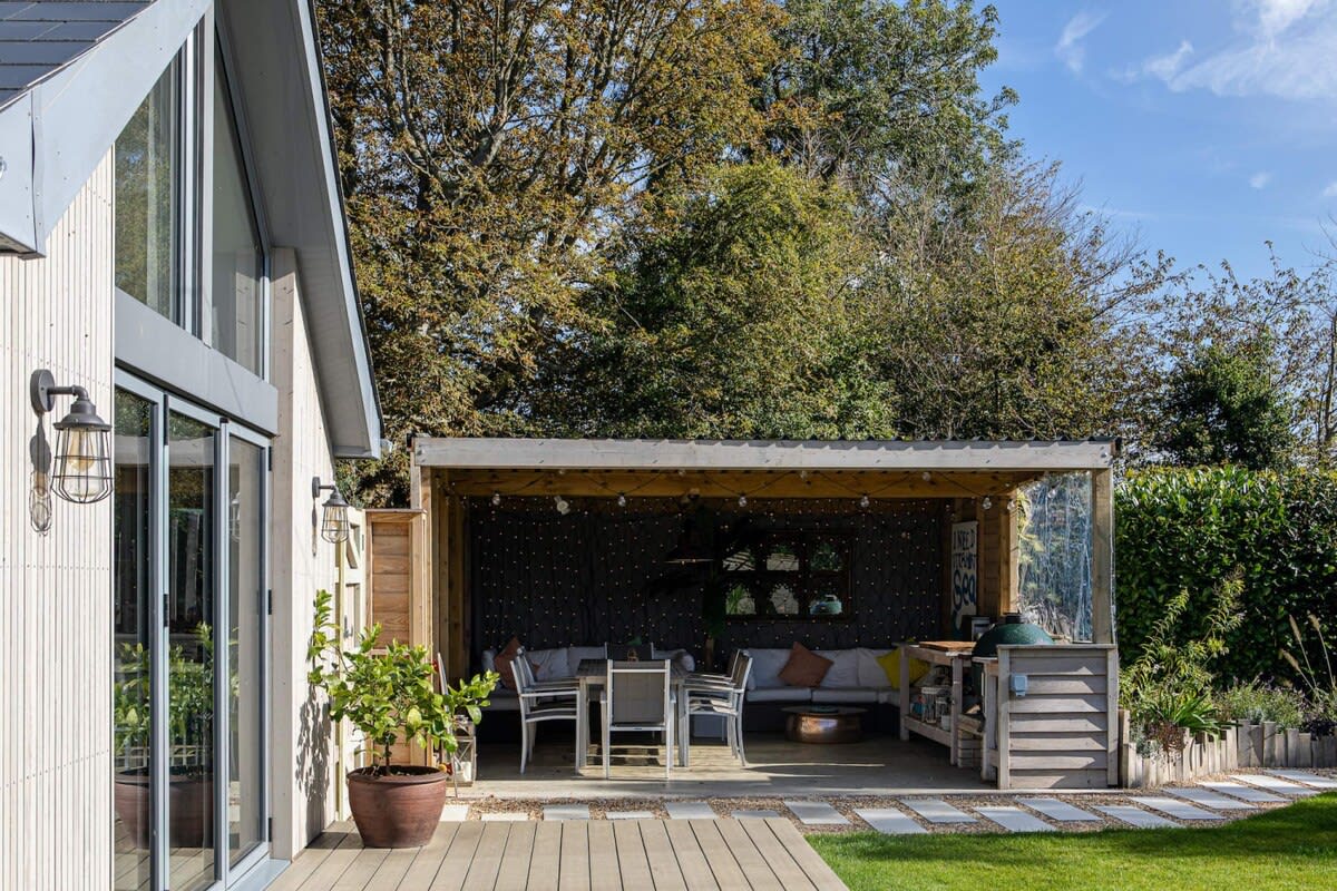 Covered outdoor kitchen and dining area