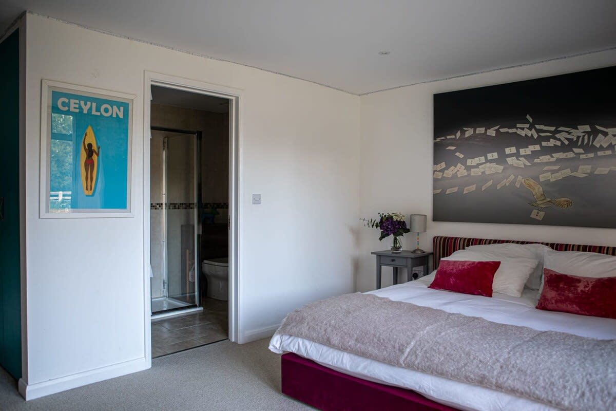 This ground floor bedroom offers direct access to the ensuite bathroom