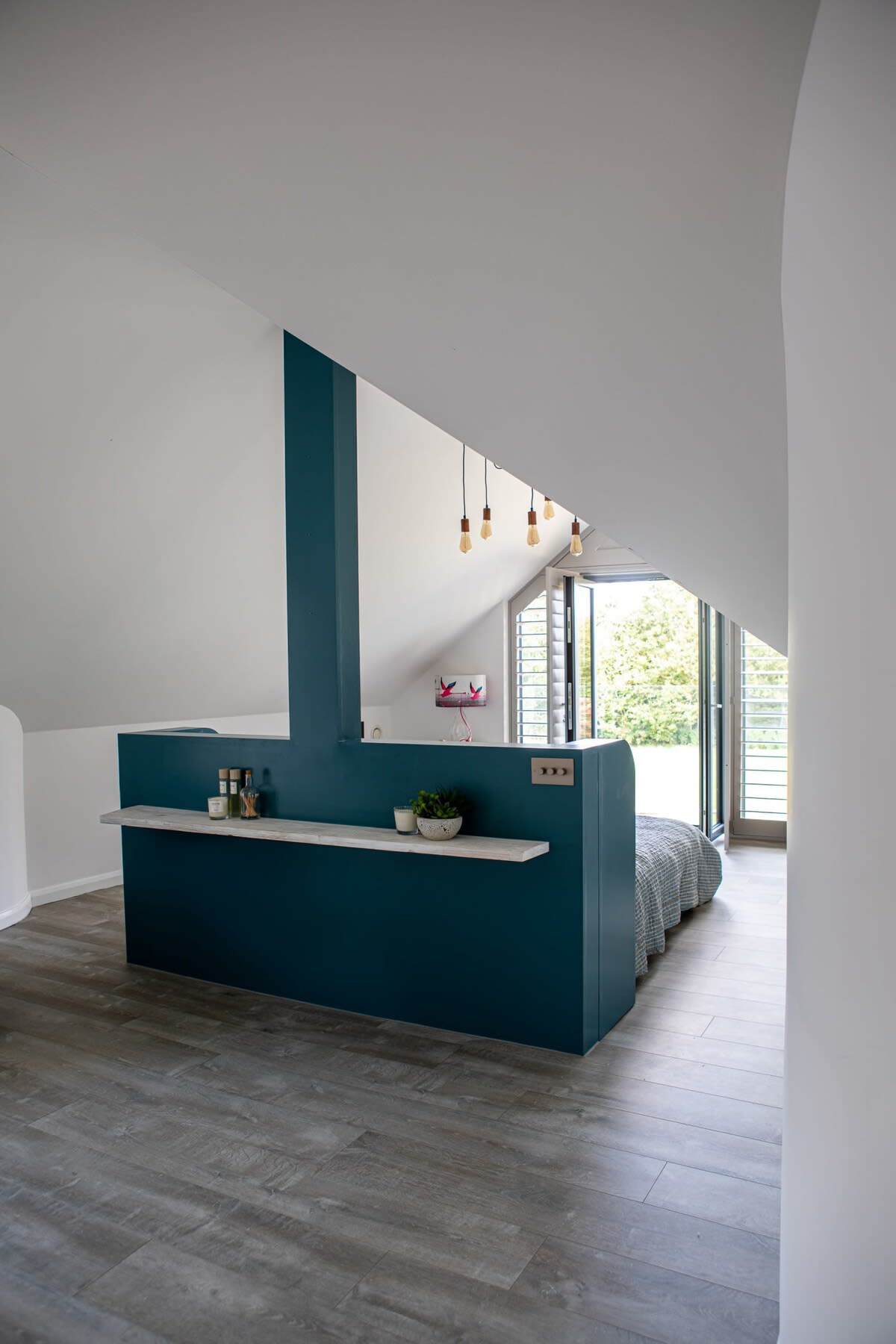 The master bedroom is situated on the upper floor