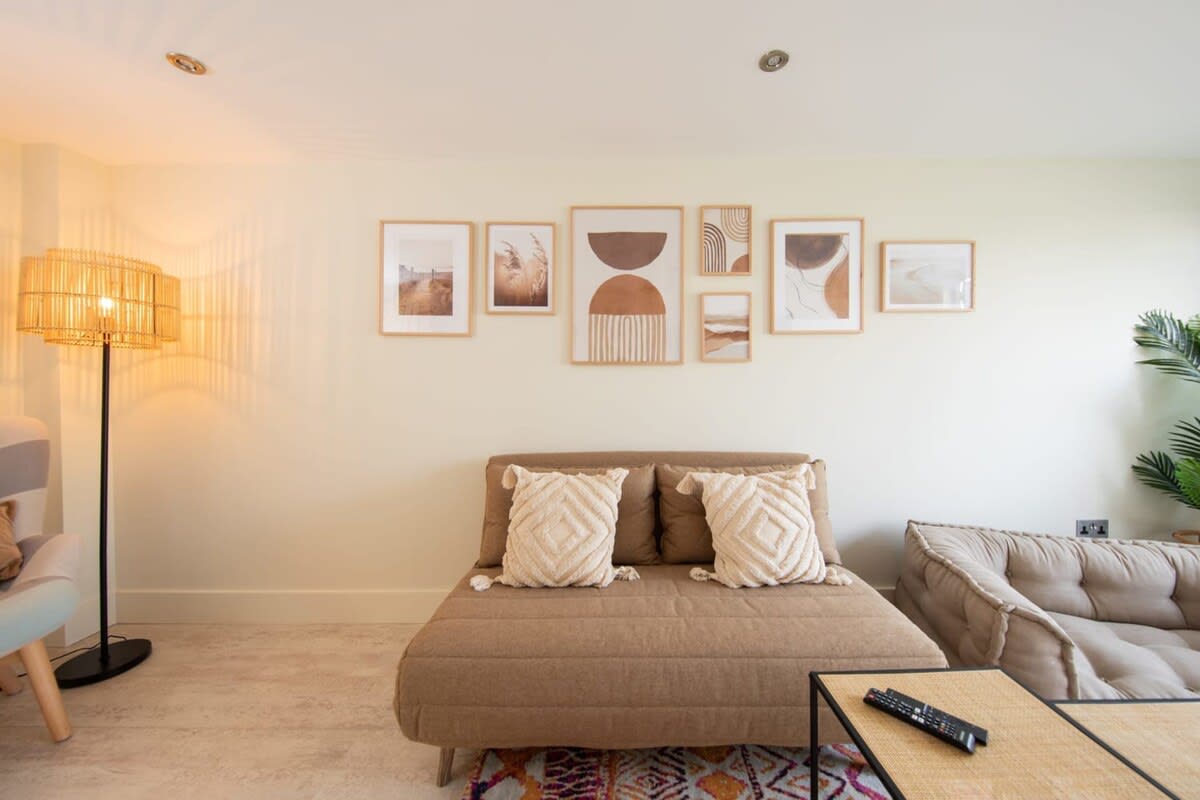 This stylish sofa actually turns into a comfy sofa bed