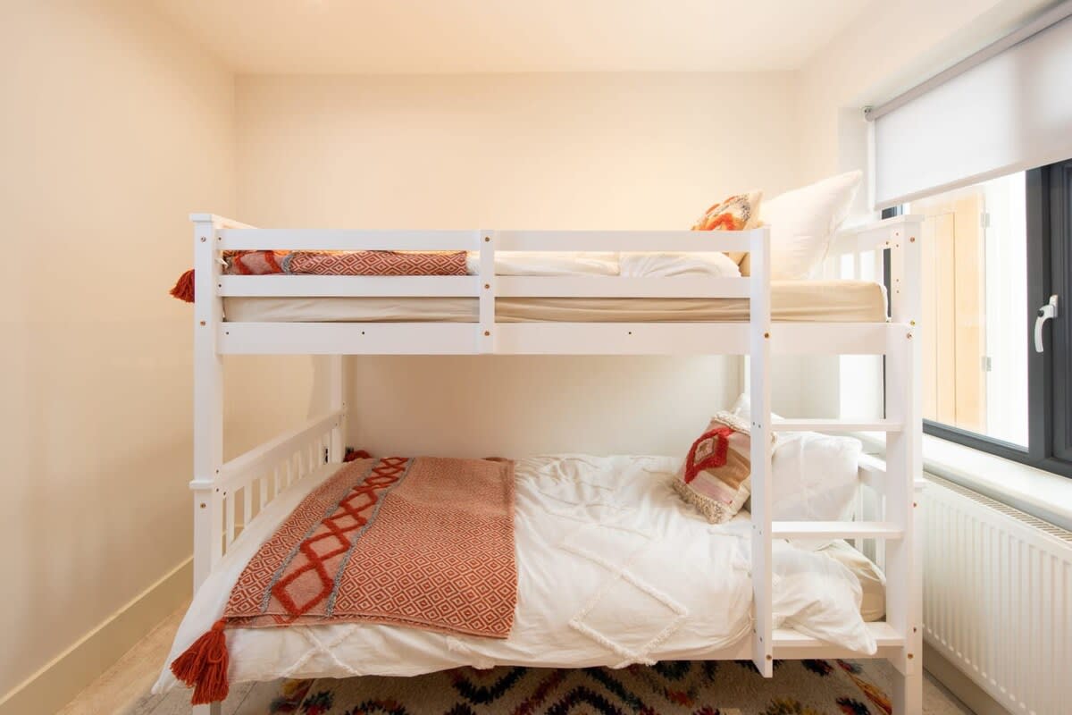 Claiming the top bunk has always been a joyful activity