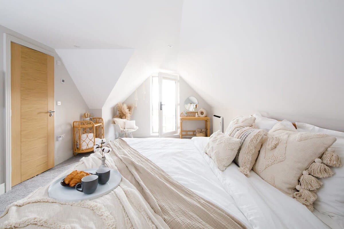 Luxurious bedding, throws and cushions in the master bedroom. Enjoy a superking sized bed, shower en-suite and balcony.