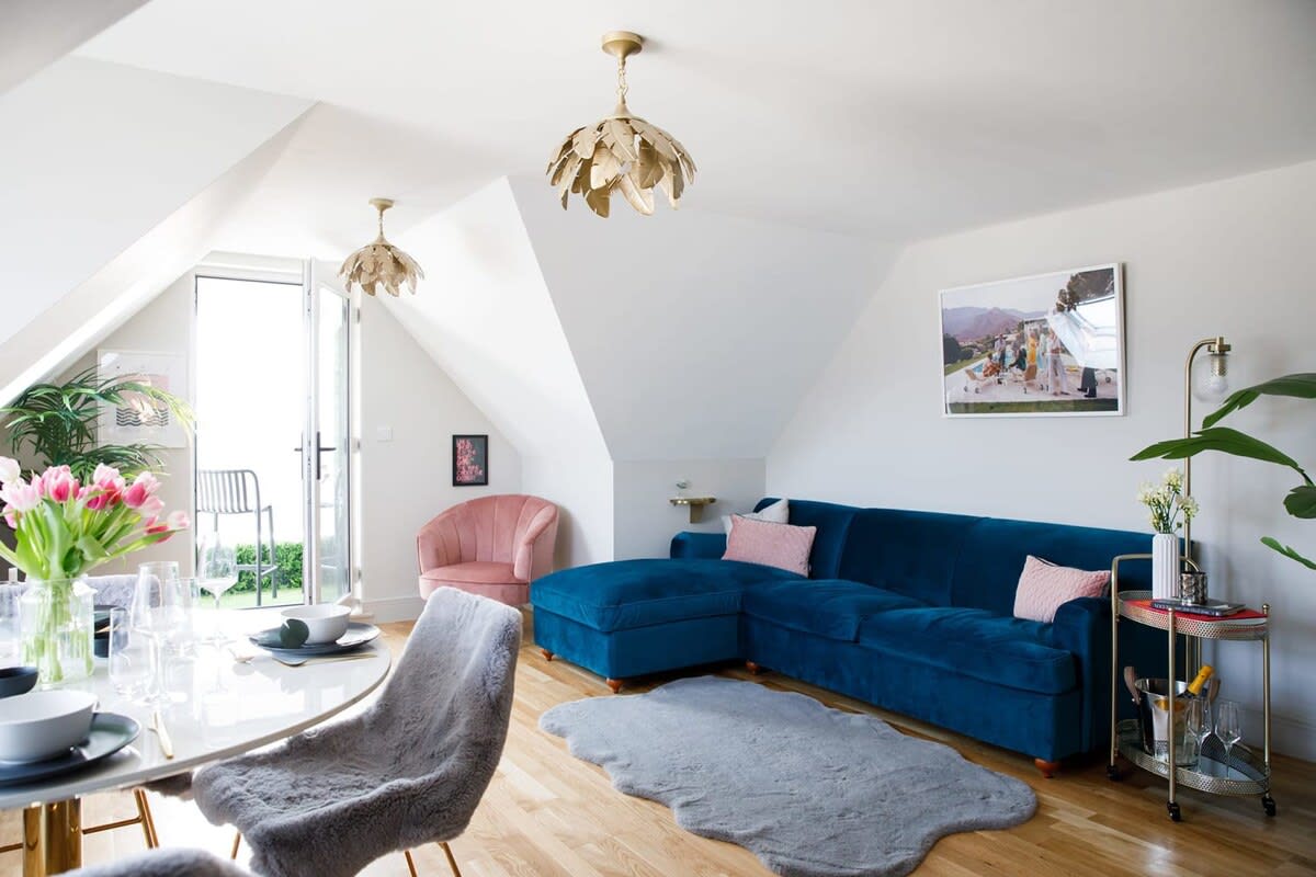 The large comfy sofa is big enough for the whole family.