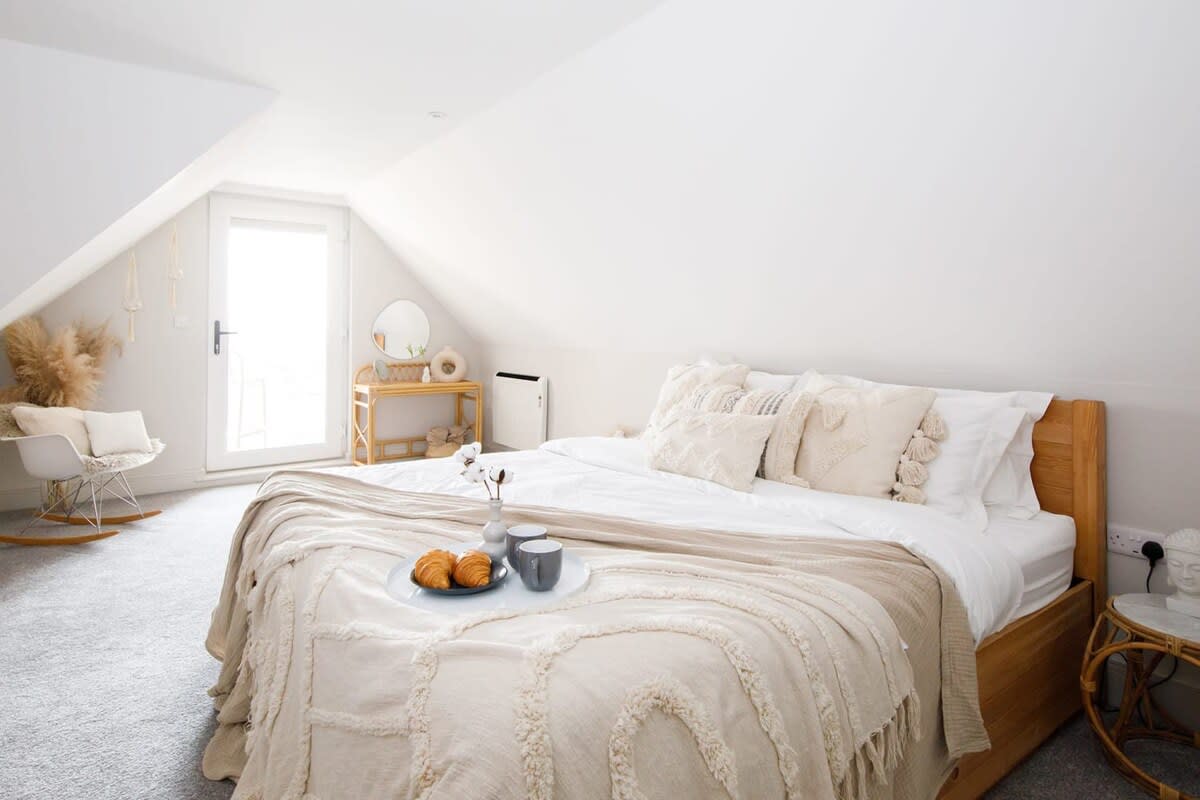 Enjoy luxurious linen and comfy pillows (maybe even breakfast in bed) in the master bedroom.