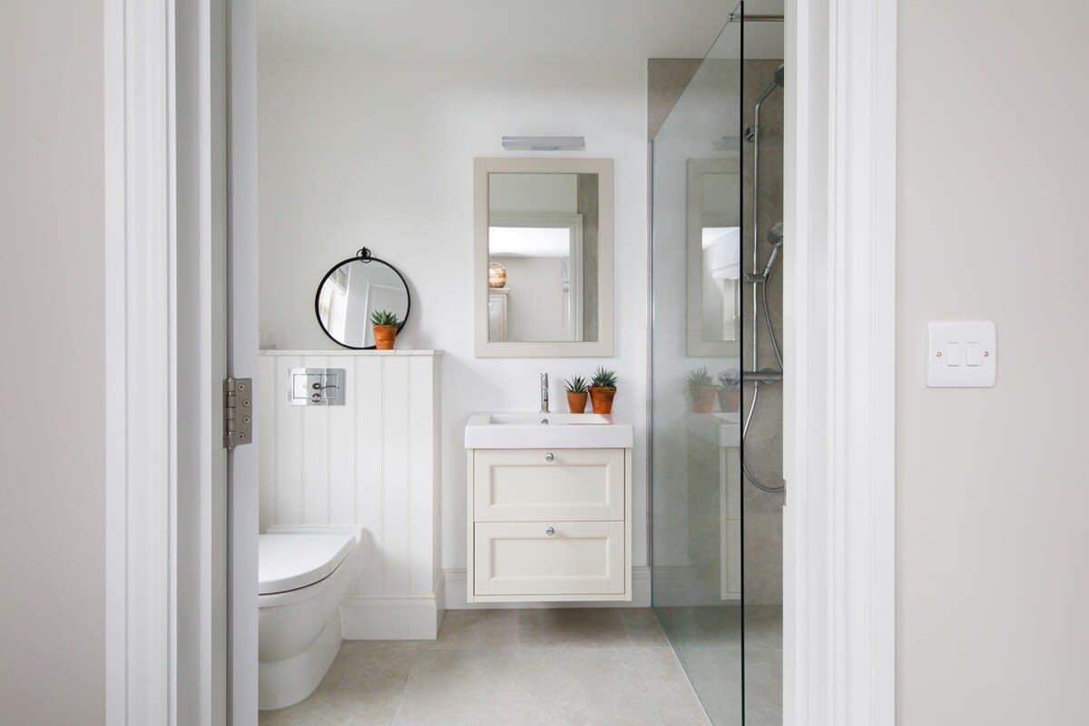 Another full bathroom with a walk-in shower