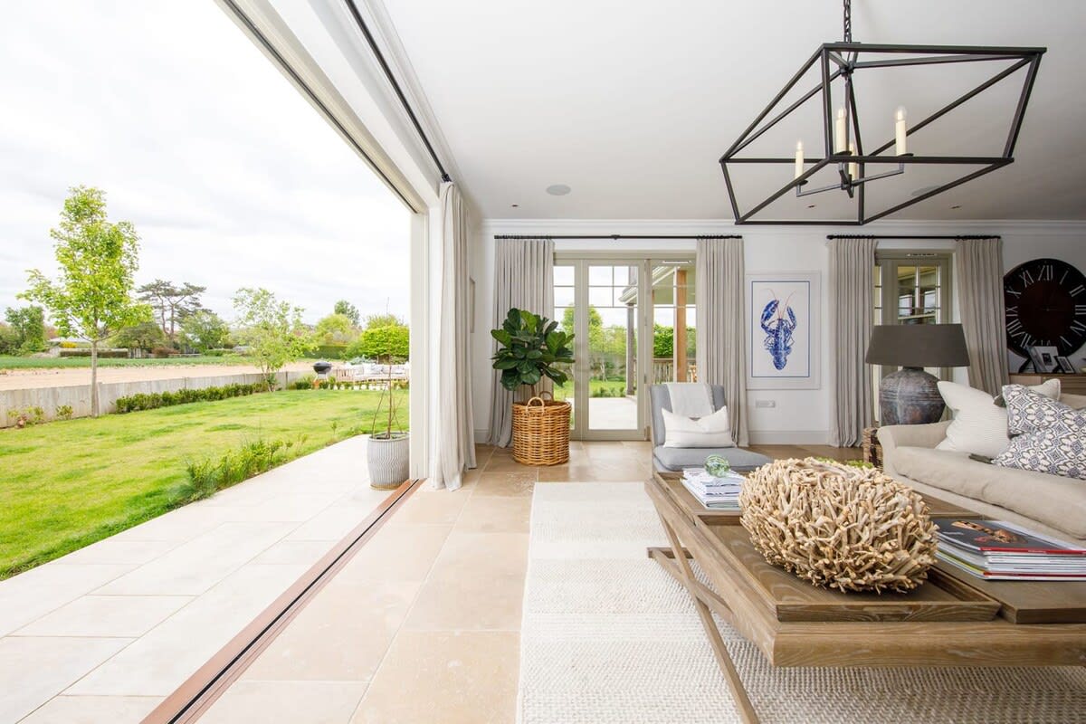 Open up the doors and make the sitting area a part of the garden