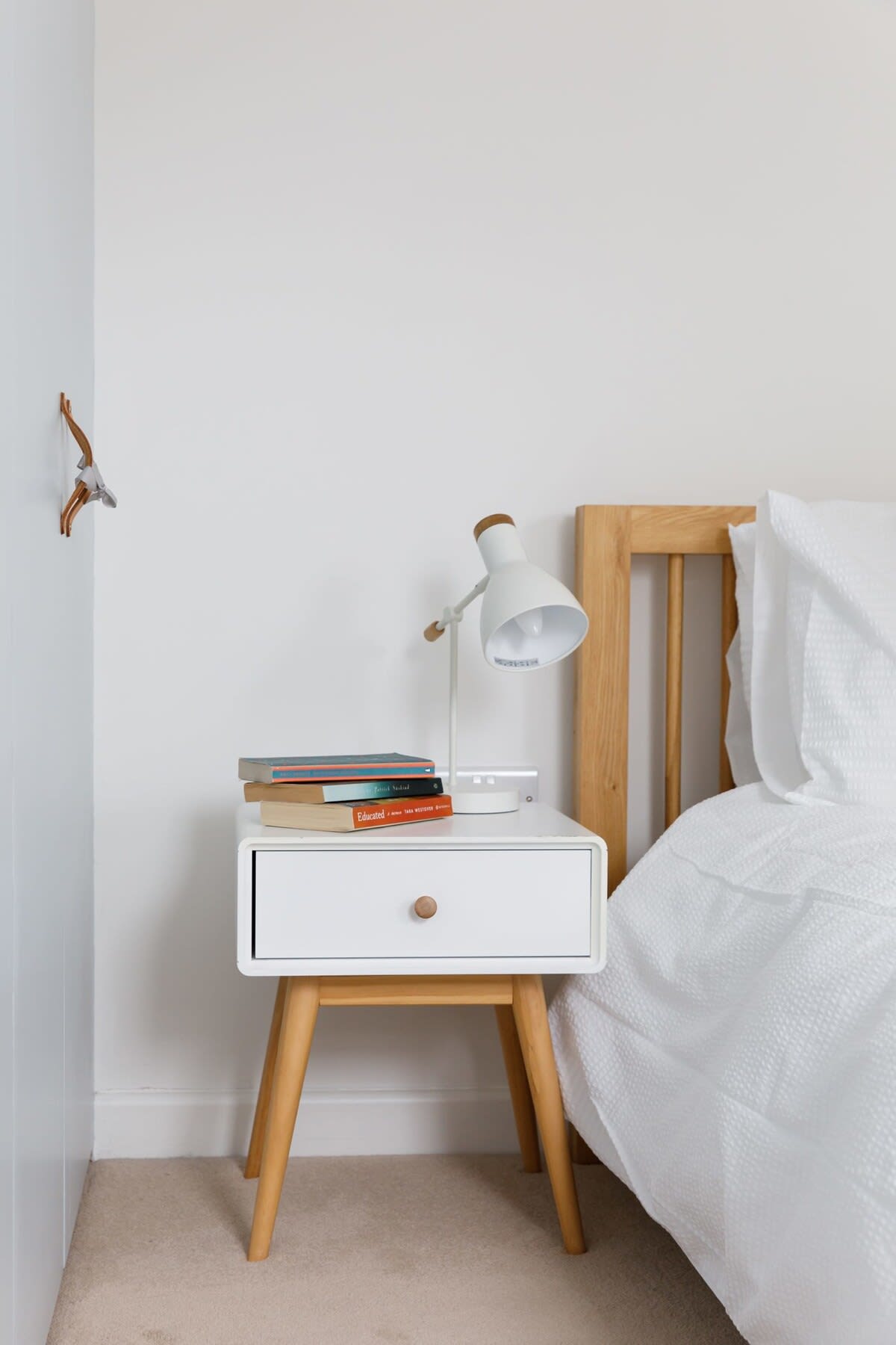 Reading lamps and bedside tables in all rooms.