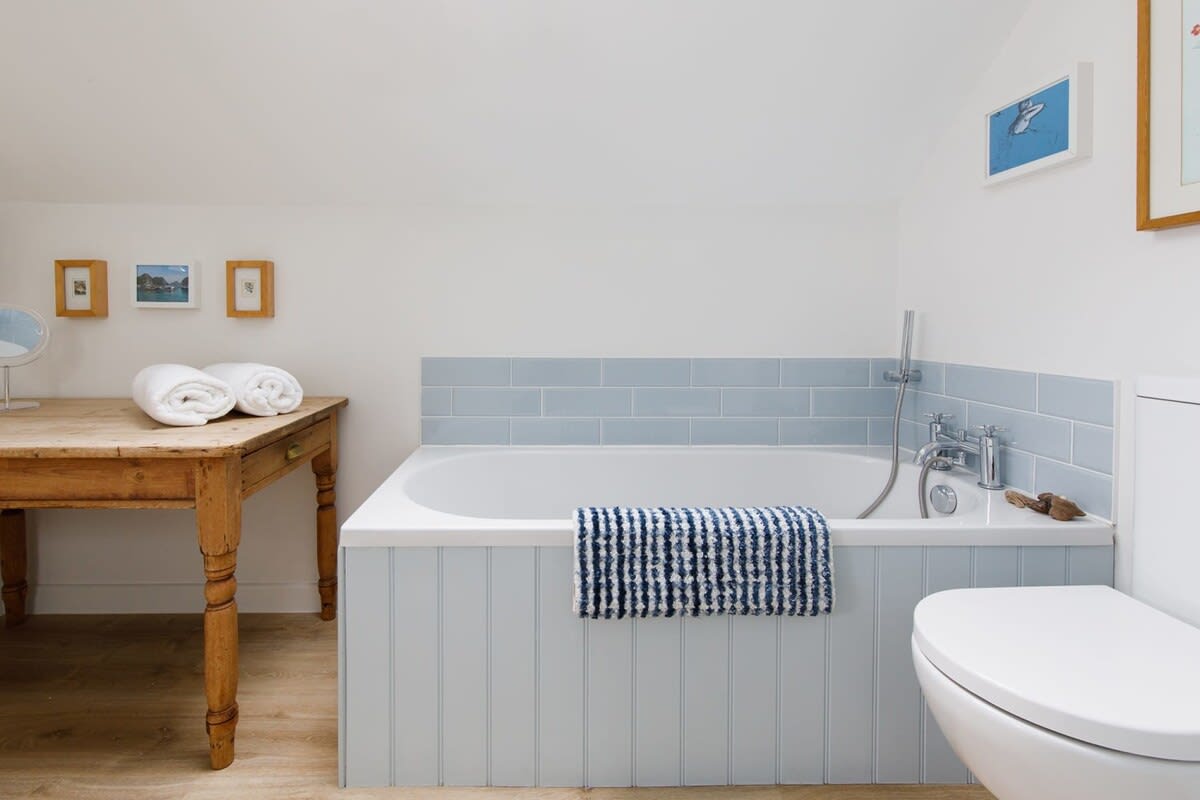 Family bathroom with separate shower..