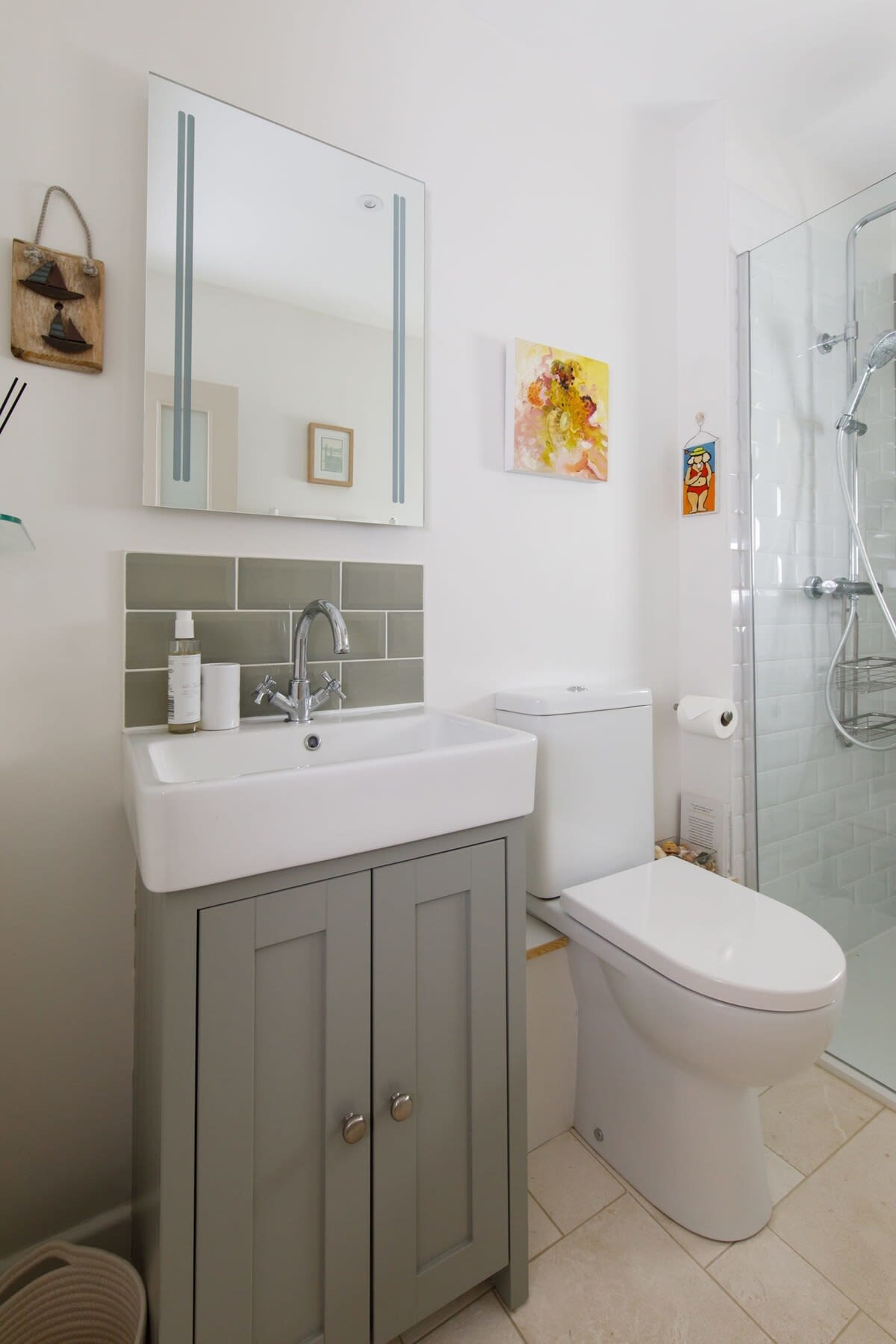 Downstairs shower room with WC and sink.