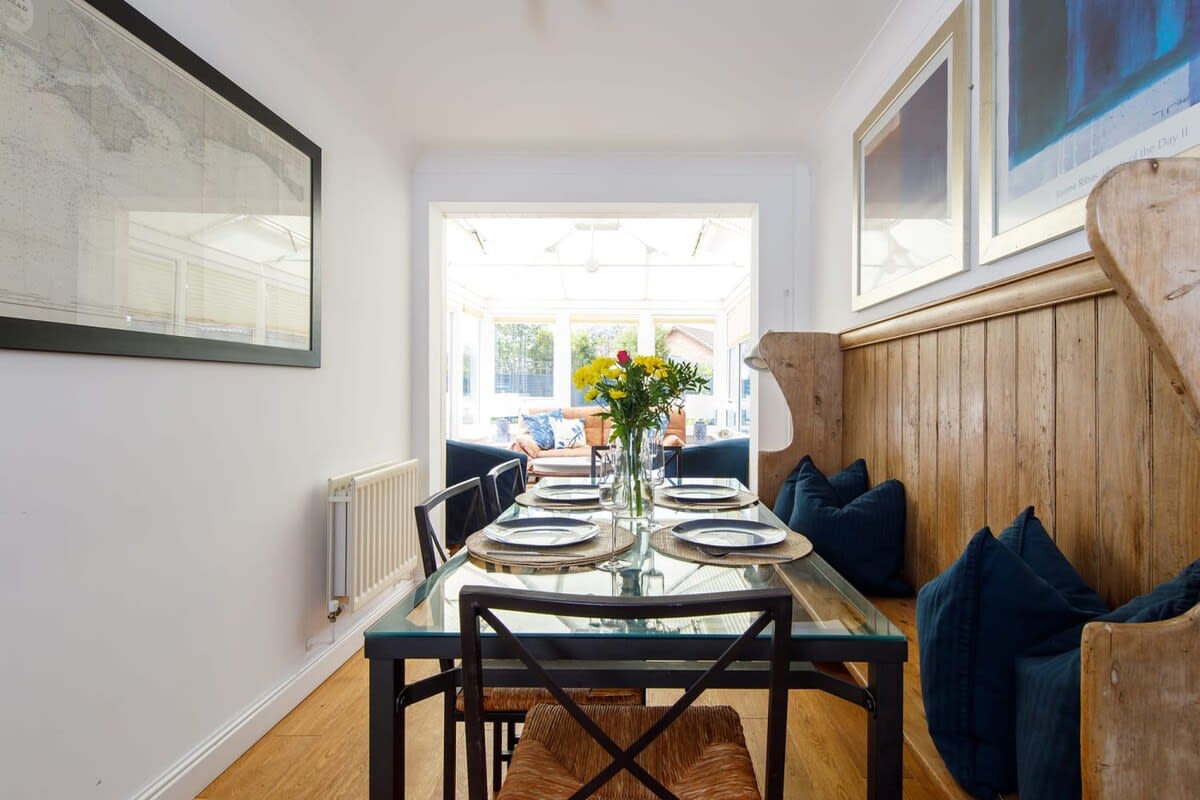 The dining area is beautifully decorated and has seating for up to 6 people.