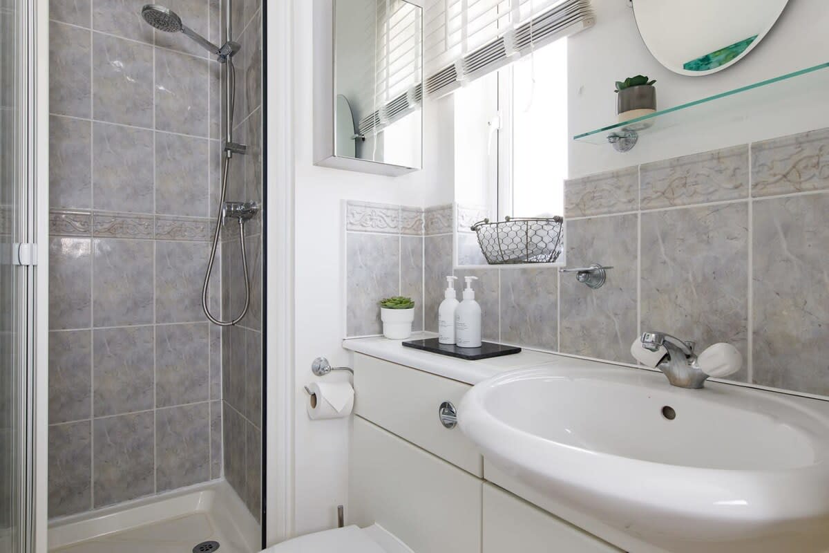 The ensuite shower room adjoins the king bedroom.