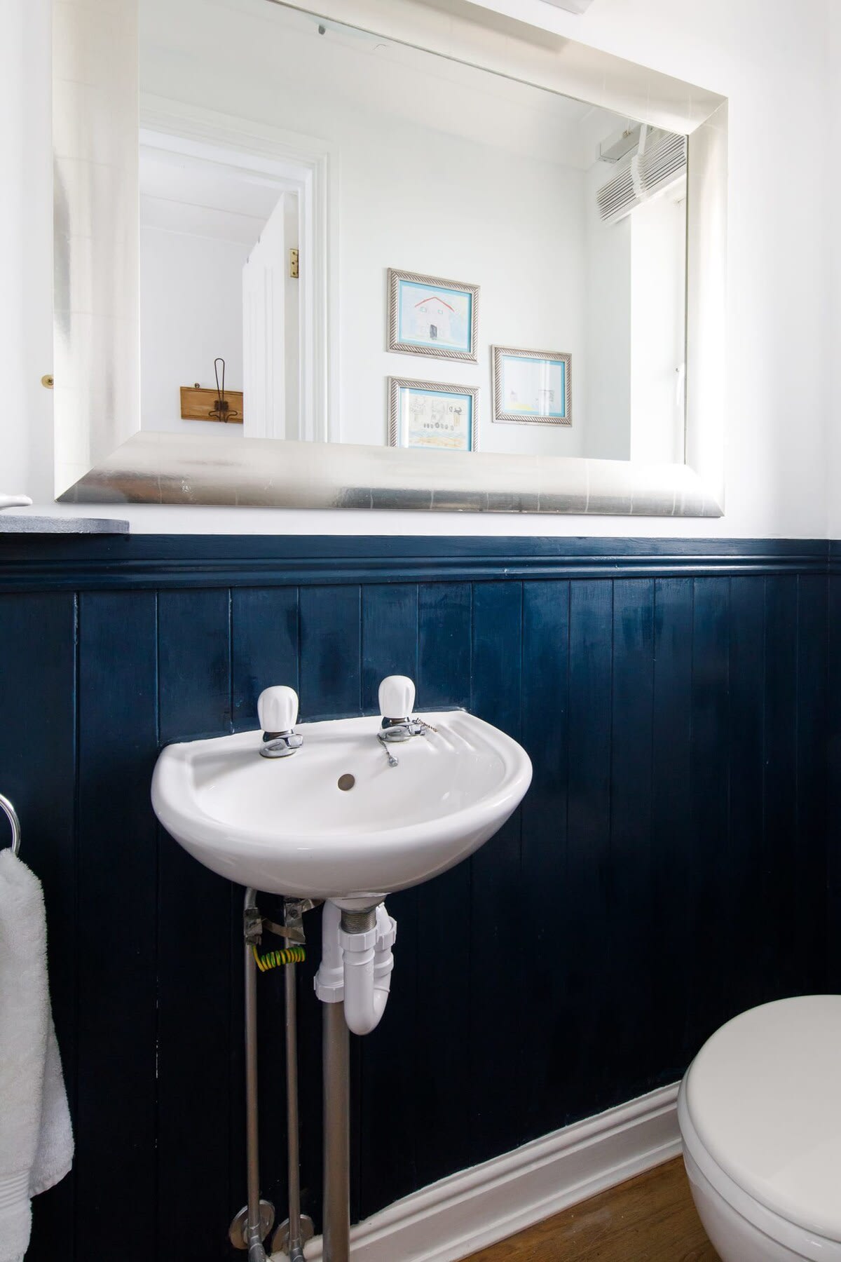 You'll find a handy downstairs cloakroom.