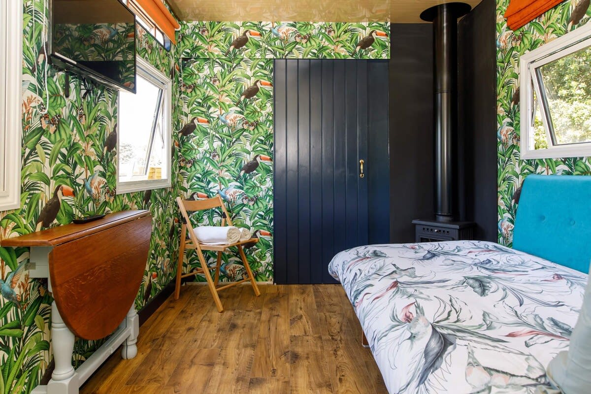 The living/dining space converts into a second bedroom.