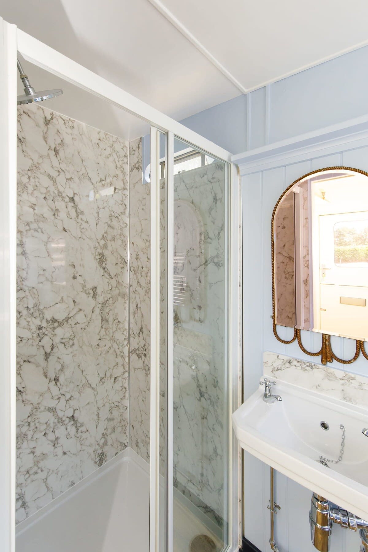 The shower is spacious and beautifully designed.