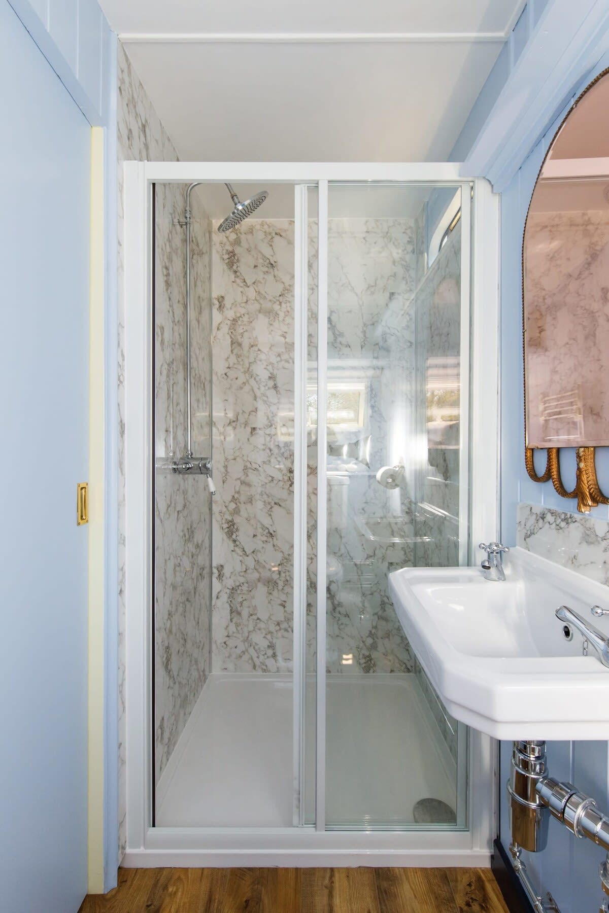 Rinse off after the beach before heading out to the patio for a cold drink.