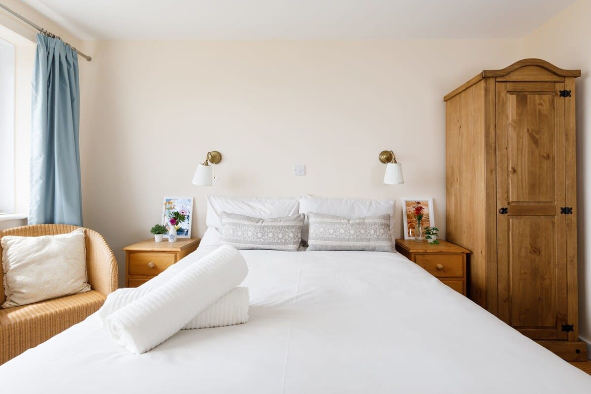 The master bedroom has a double bed and wonderful sea views.