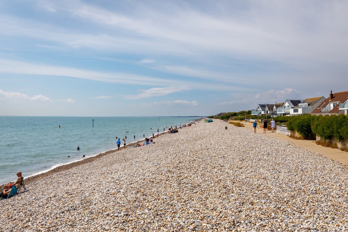 The chalet is a stone's throw from the beach...literally!
