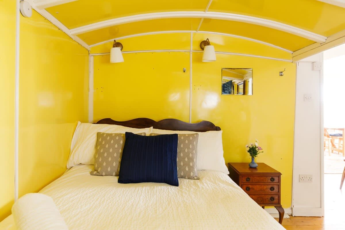 With side tables, lighting and cushions, you'll instantly feel at home.