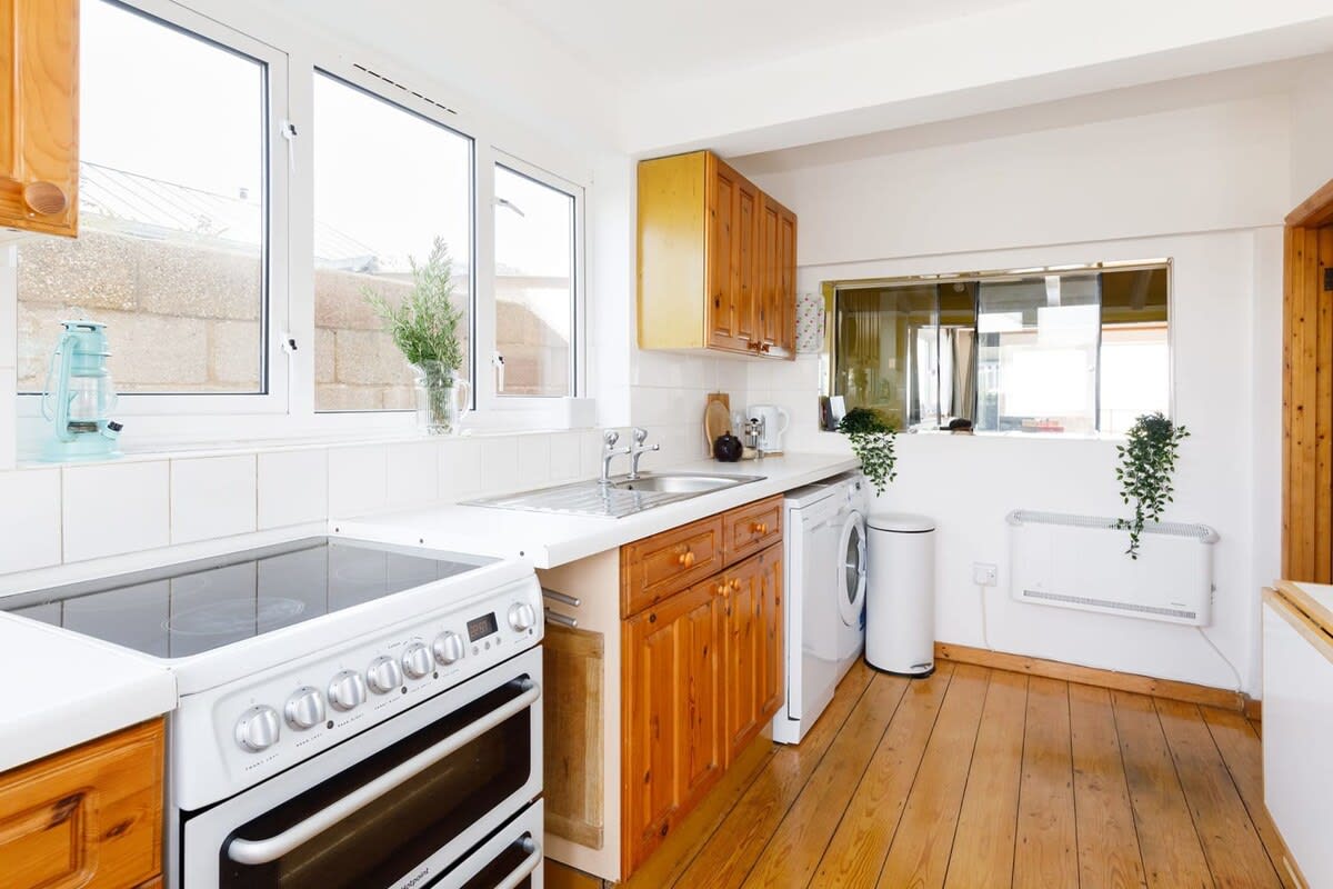 The chalet’s kitchen has all the modern appliances you need for preparing meals.