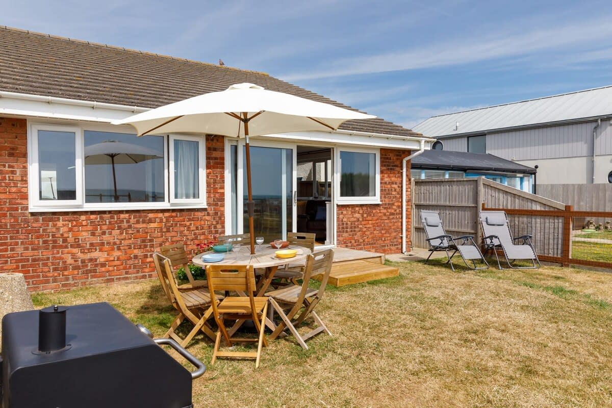 Enjoy BBQs and sunshine in the chalet's garden, complete with BBQ, dining furniture and sun loungers.