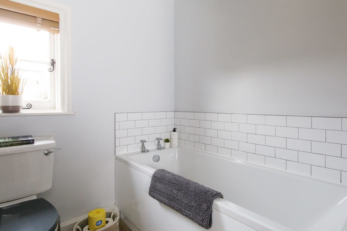The full family bathroom is light and bright.