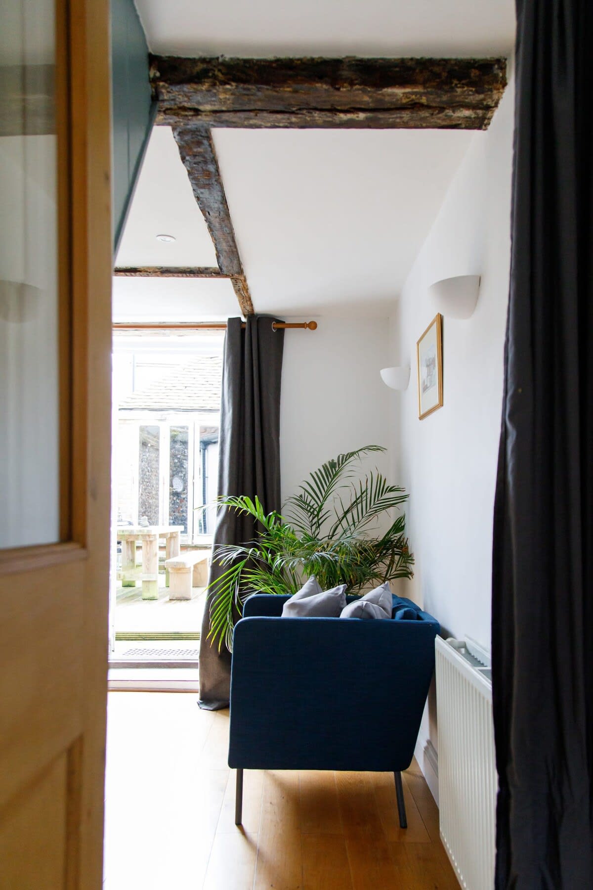 The Grade II listed townhouse has character charm, with exposed beams and wooden flooring.