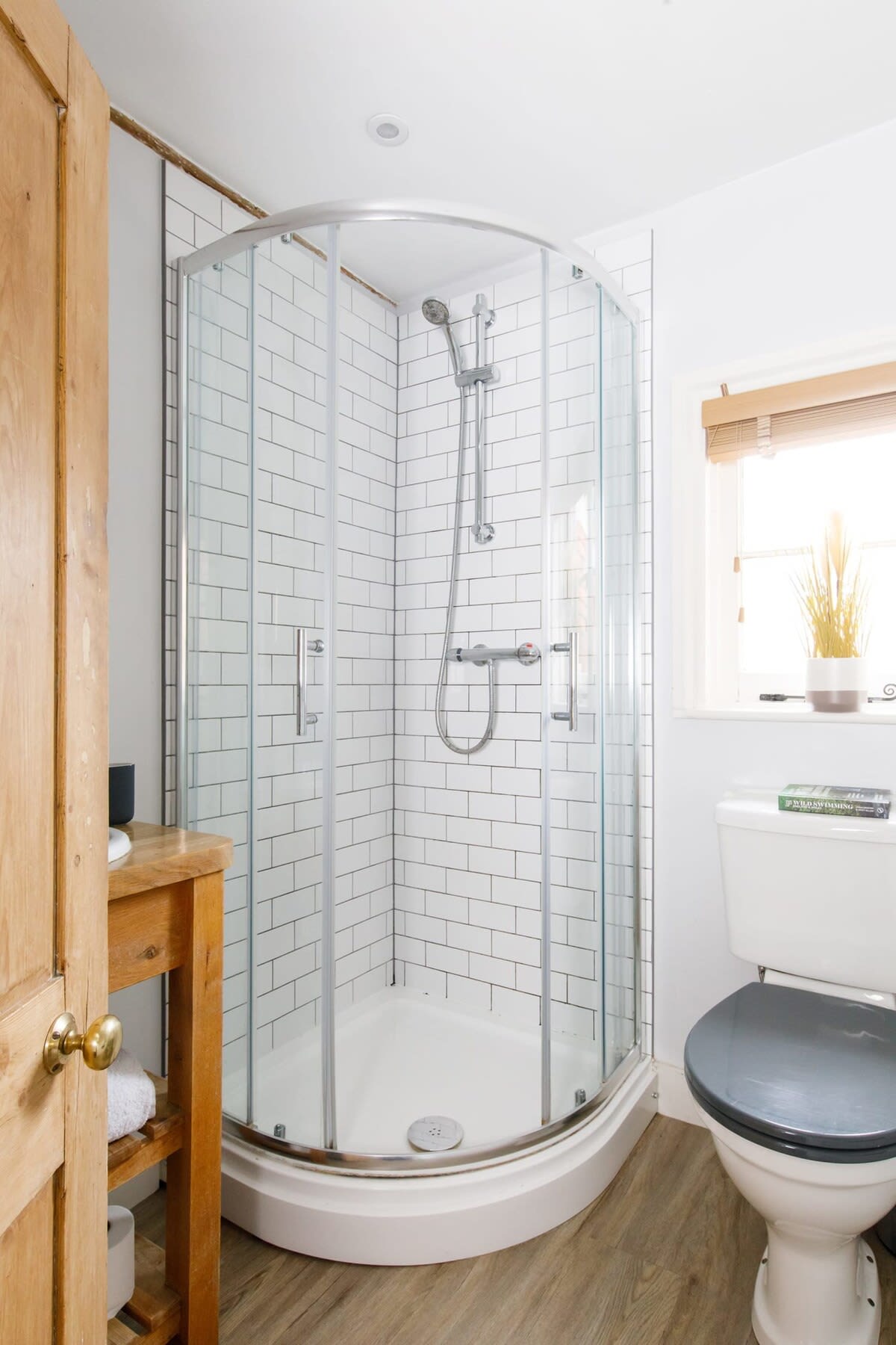 There is a separate, free standing shower.