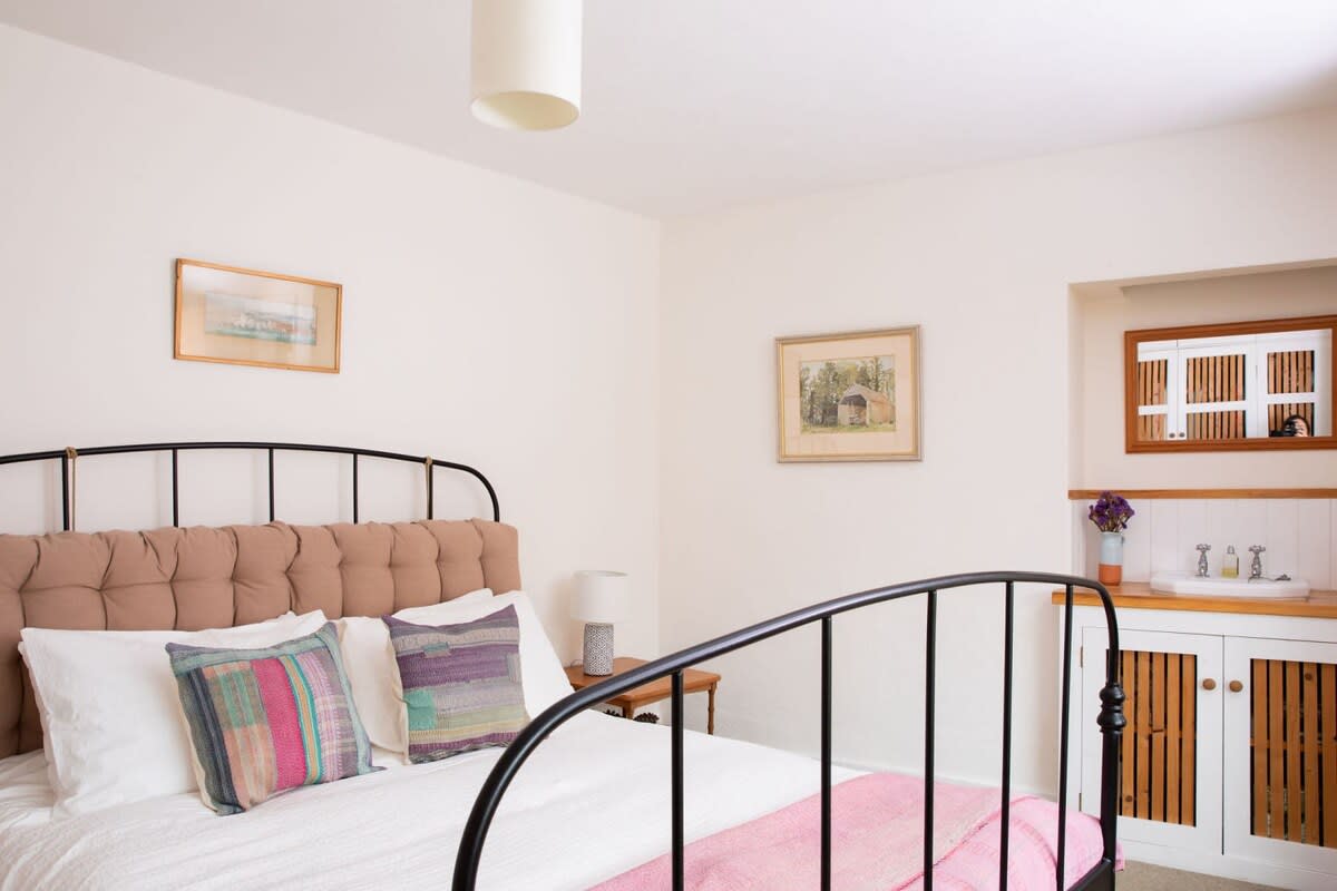 Sink into this comfy king bed after a busy day exploring the area.