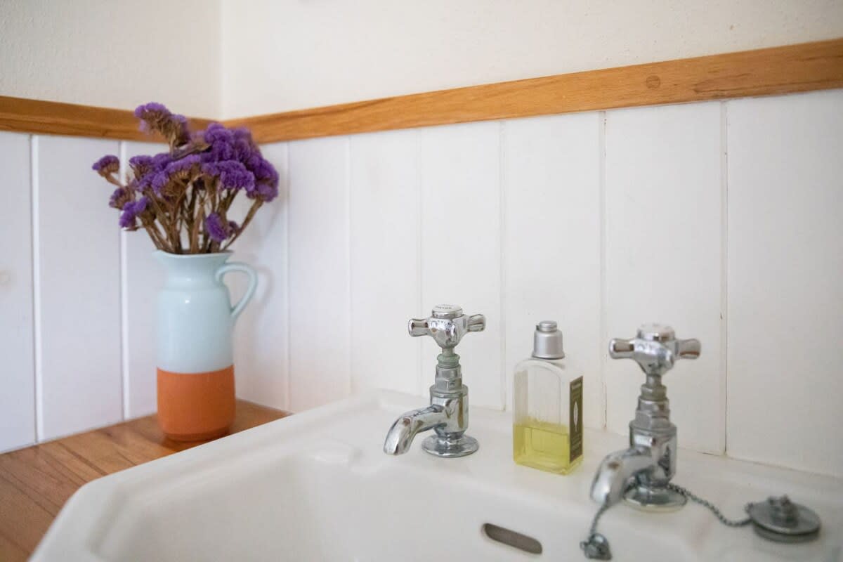 The downstairs king room has a sink for your convenience and comfort.