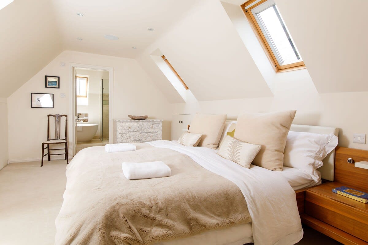 The impressive master bedroom with emperor bed and ensuite.