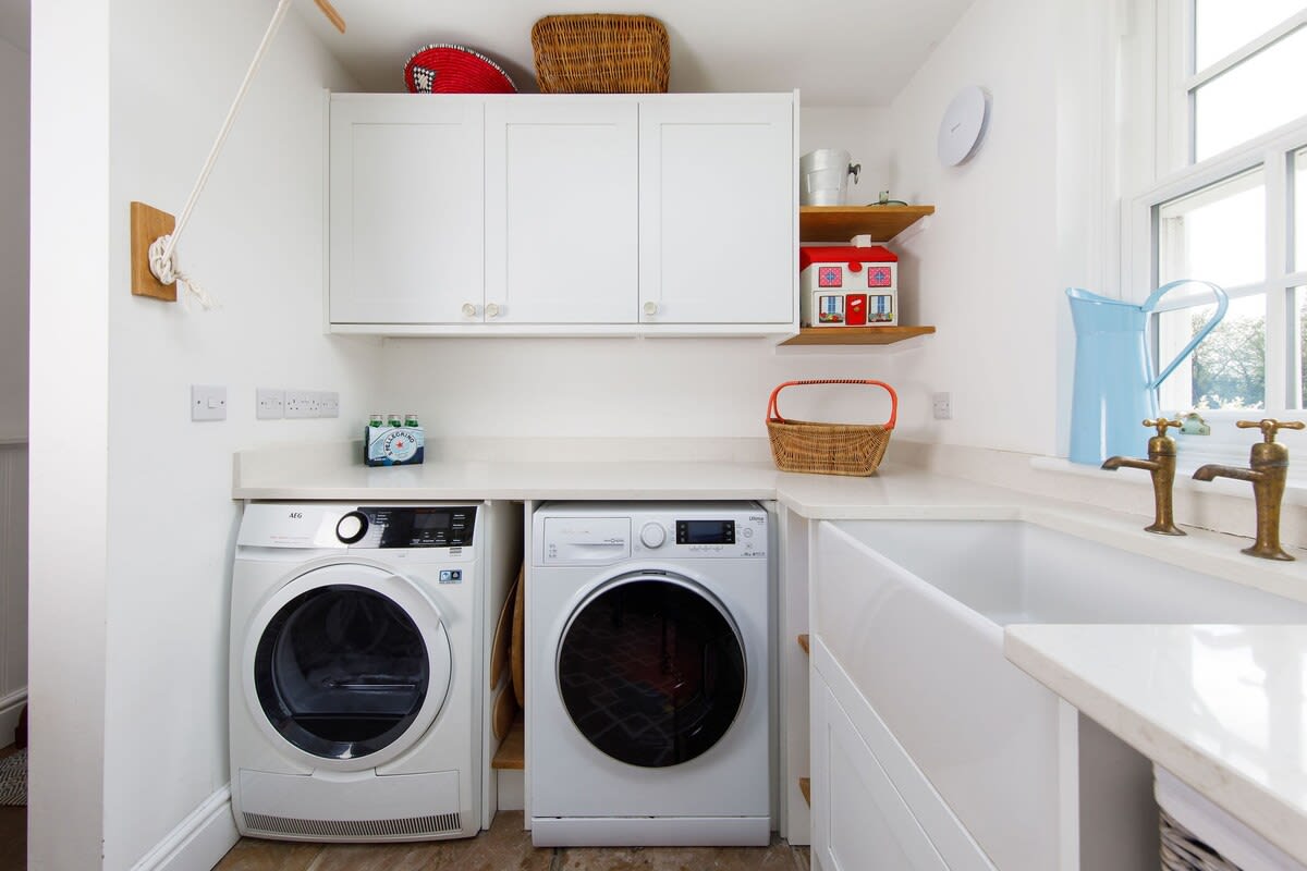 Washer and dryer set up in the utility room.