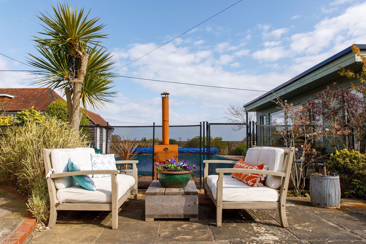 Relax outside in one of many pretty seating areas.