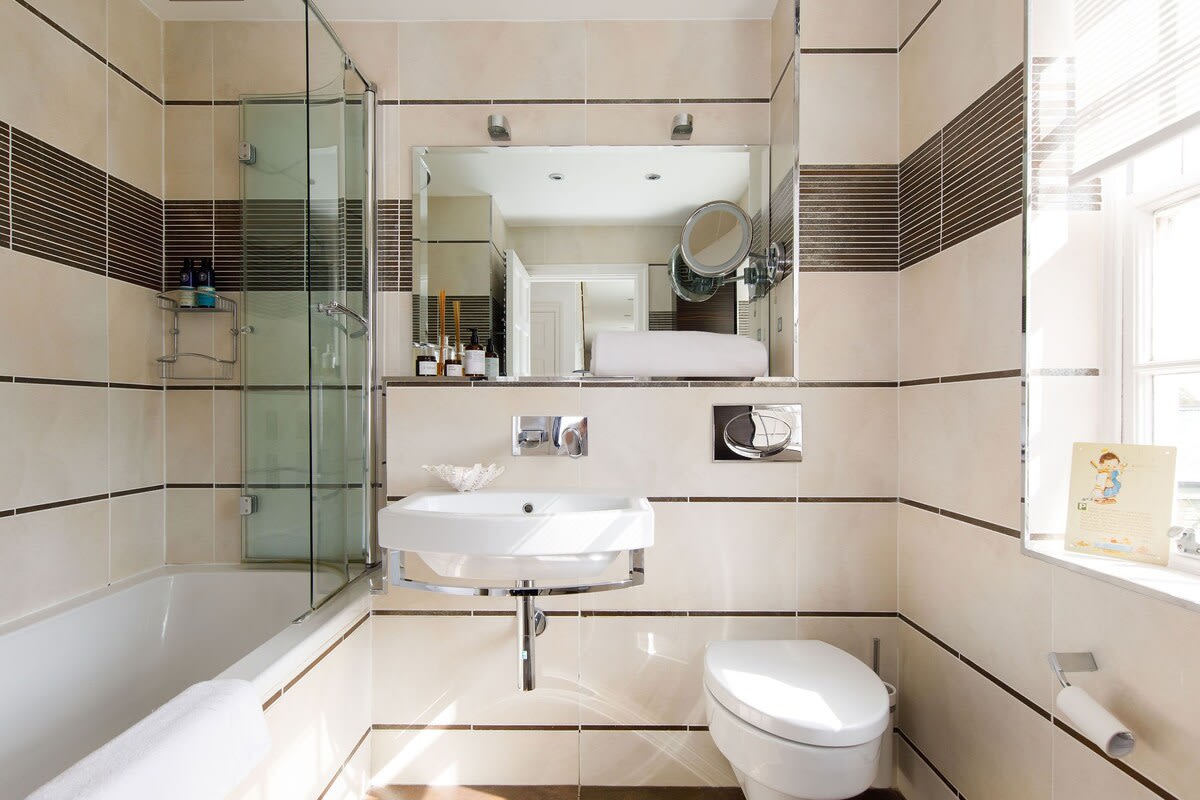 There is total of three bathrooms plus downstairs cloakroom, so no one will be waiting their turn to get ready in the morning.